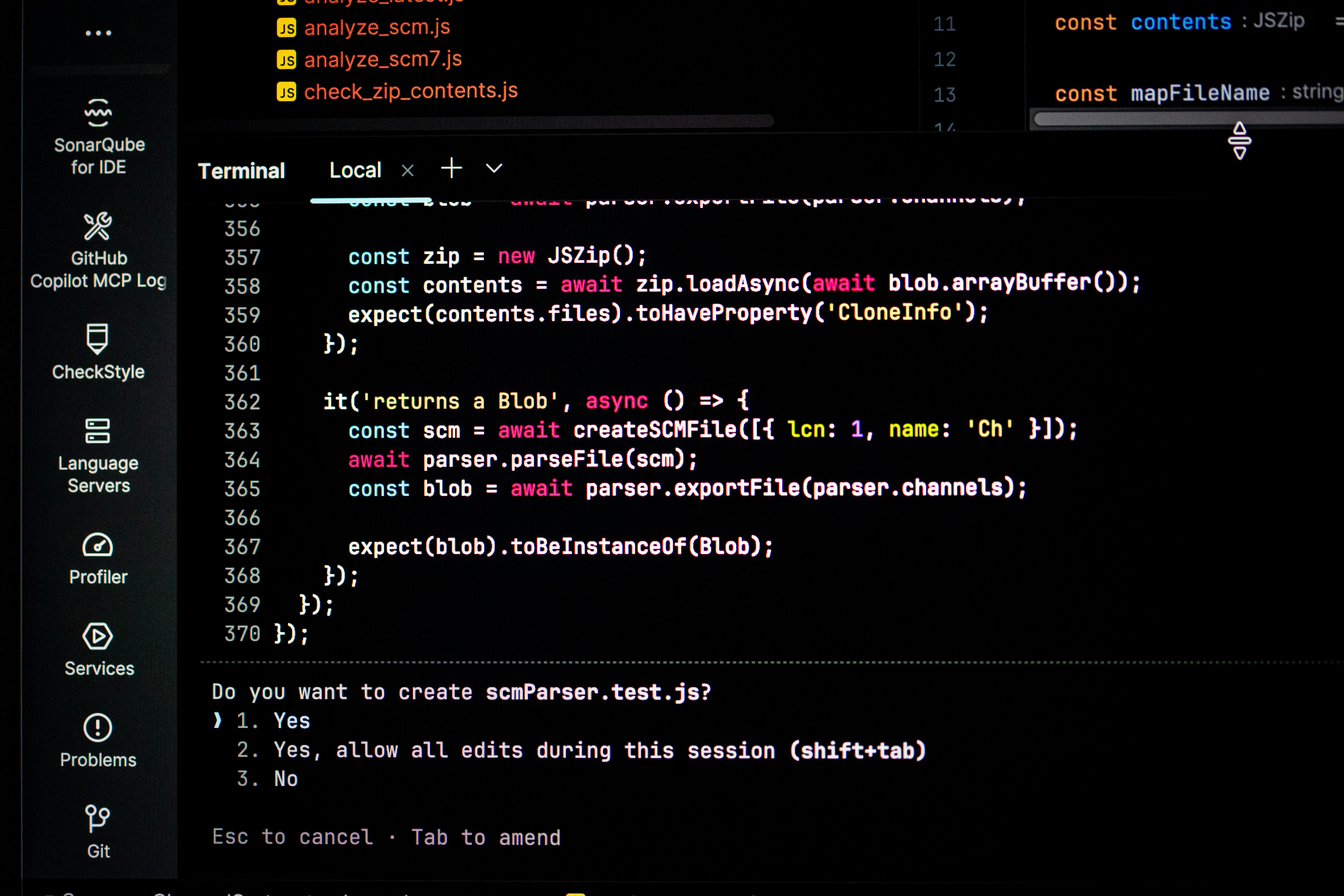 Computer screen displaying code and terminal prompts
